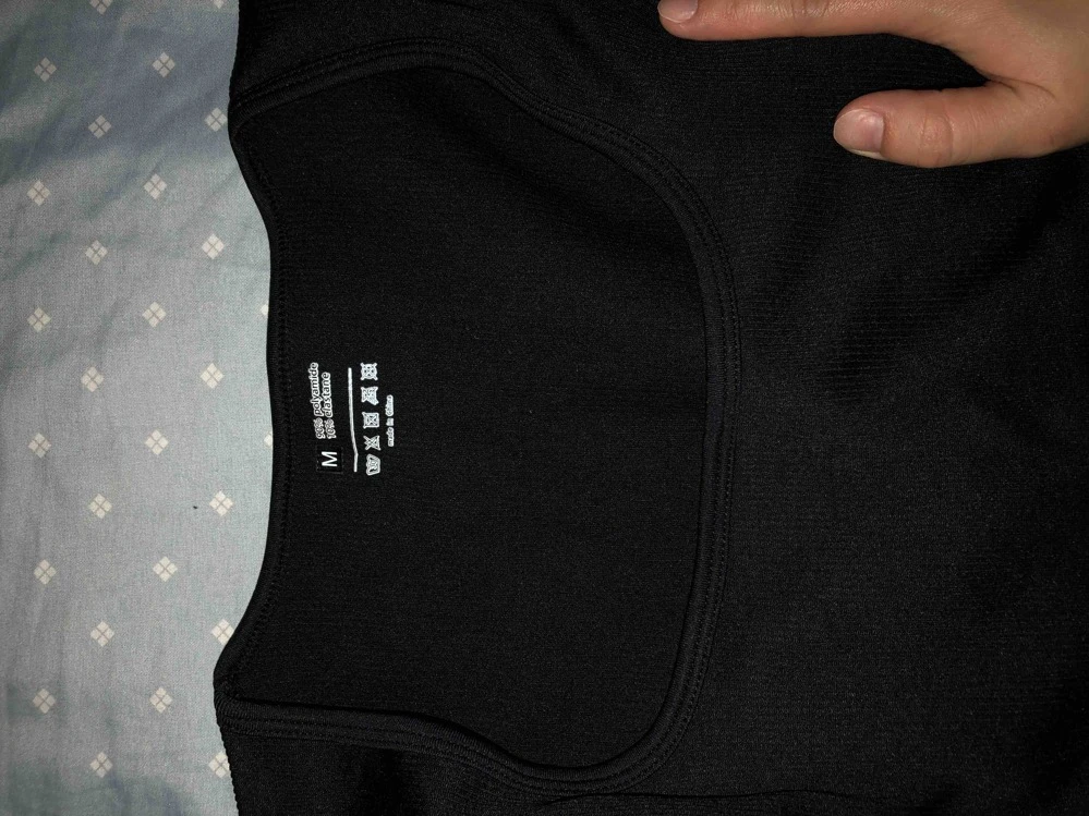 Enterizo deportivo negro manga larga tela acanalada 1