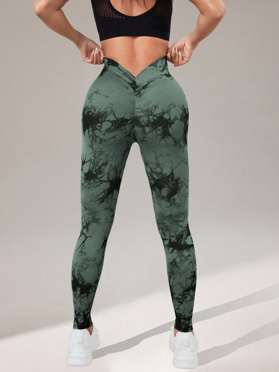 Legging deportivo tie dye verde tipo V en la parte de atras